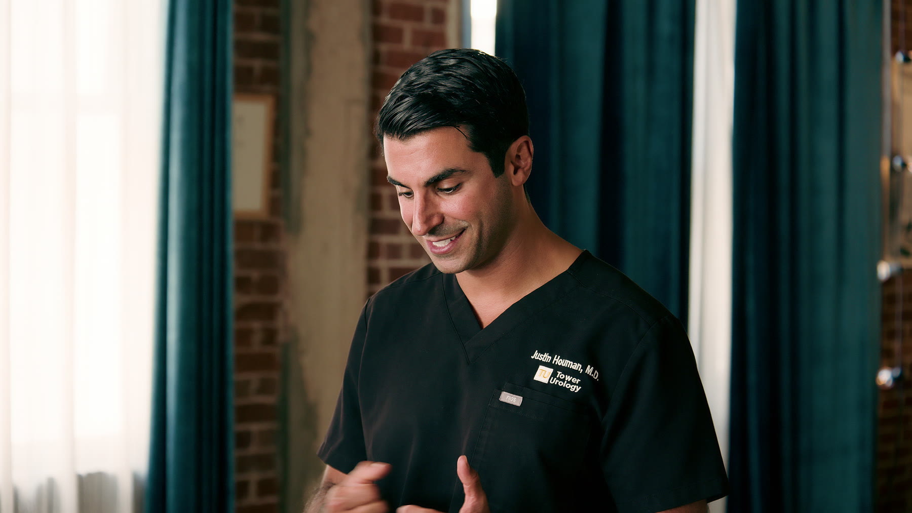 Dr. Justin Houman on set during the August 2026 shoot